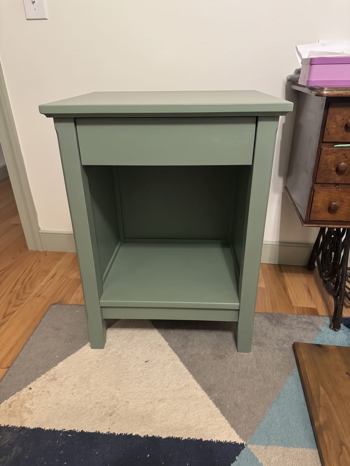 Computer-generated preview of the same nightstand painted sage green
