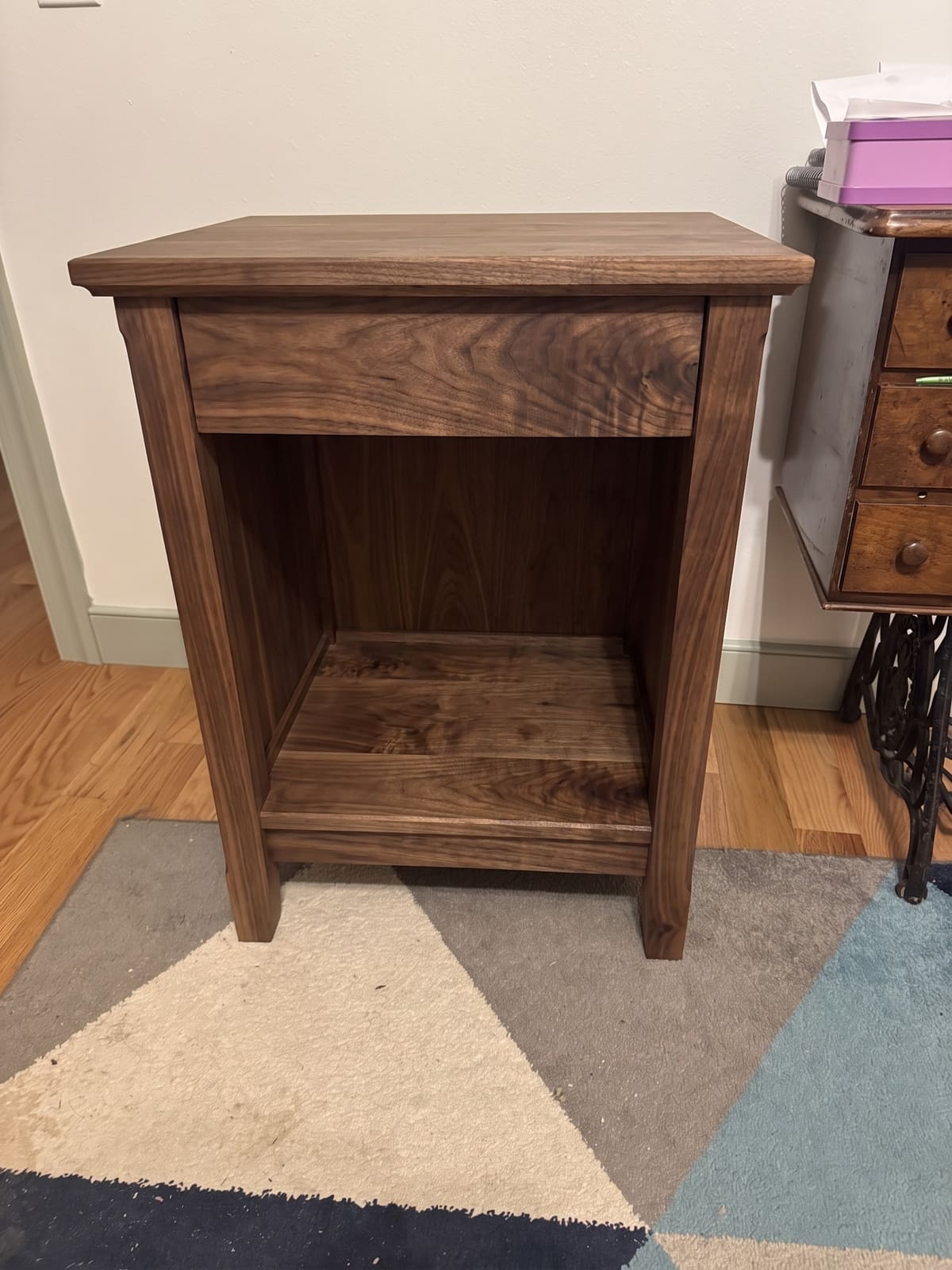 Computer-generated preview of the same nightstand in an oiled walnut